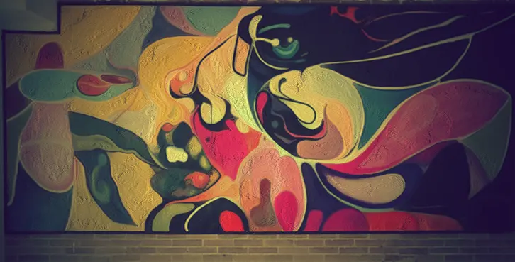 Colorful abstract mural installed in a contemporary interior